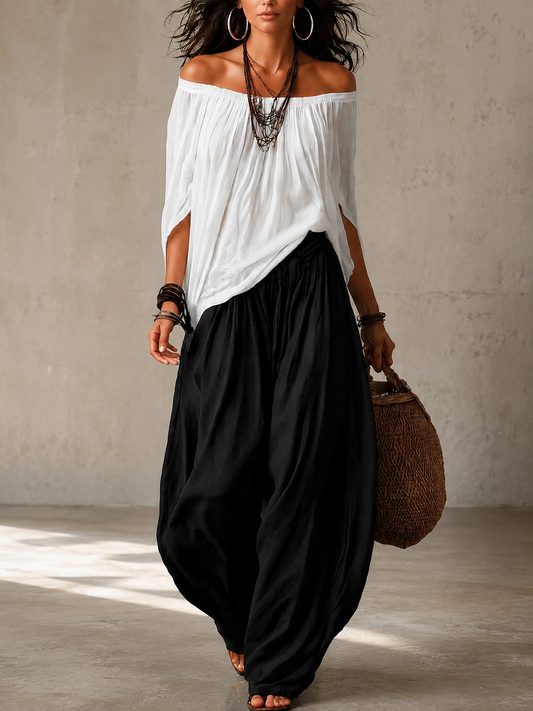 Conjunto BIANCA: blusa blanca hombros descubiertos y falda negra tipo globo