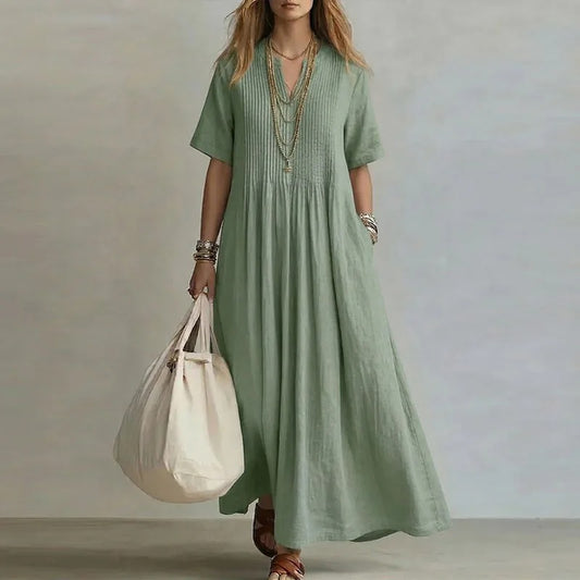 Vestido largo verde salvia con manga corta y fruncido en el pecho