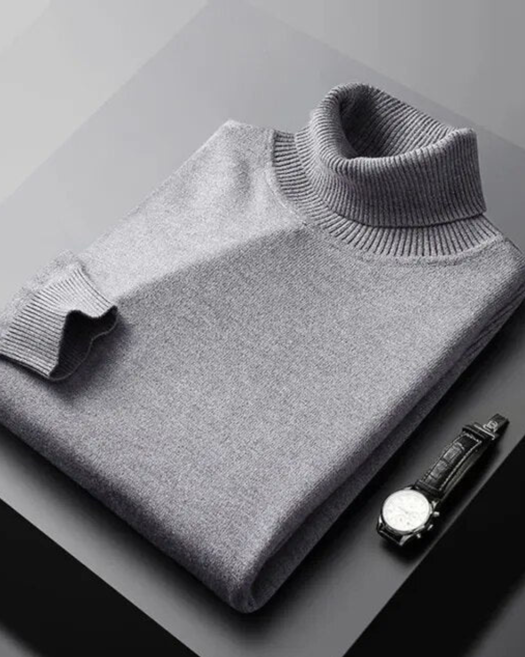 Jersey gris de punto con cuello alto acanalado y manga larga, acabado liso