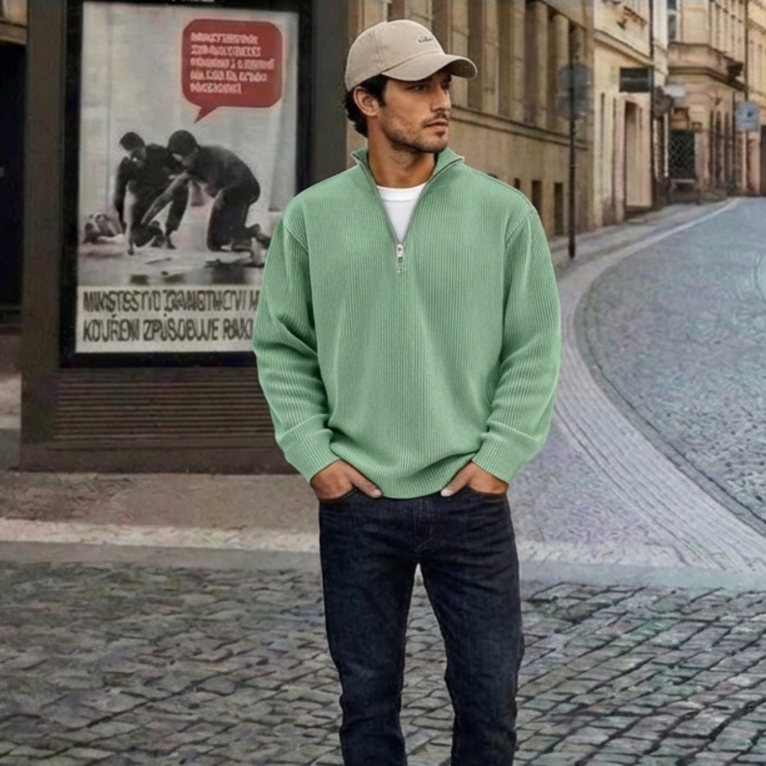 Suéter de punto verde menta con media cremallera y cuello alto, manga larga.