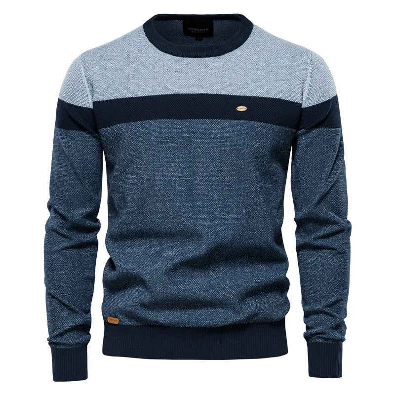 Jersey de punto bicolor azul marino y gris, cuello redondo, manga larga