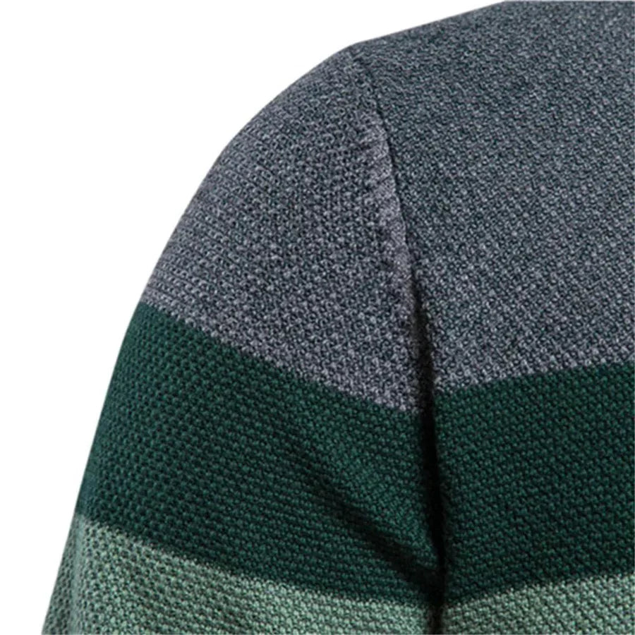 Manga de jersey bicolor gris y verde, con franja verde oscuro y tejido texturizado