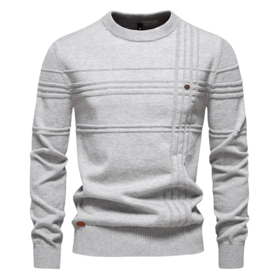 Jersey Alex gris claro de punto con cuello redondo y franjas decorativas en el pecho.