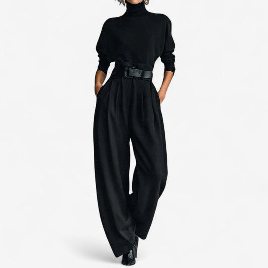 Conjunto de cuello alto negro con cinturón y pantalón de tiro alto